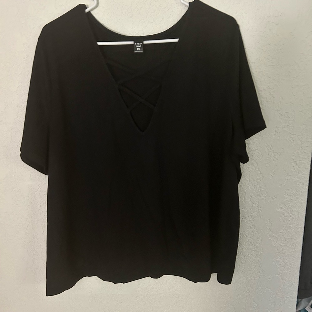 Black top with slashes down front